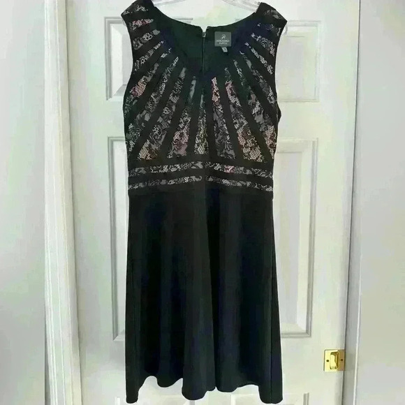 Adrianna Papell Fit & Flare Dress
Women Size14 Black Stretch
Sleeveless Back Zip - Picture 2 of 7